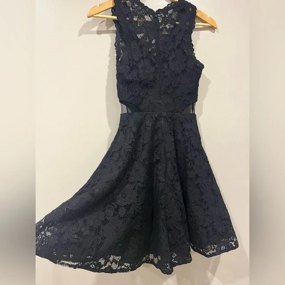 Black Lace Dress with Mesh Cut Outs. Brand- Aqua